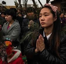Wangcun - China Comunidade católica impede demolição de igreja.jpg